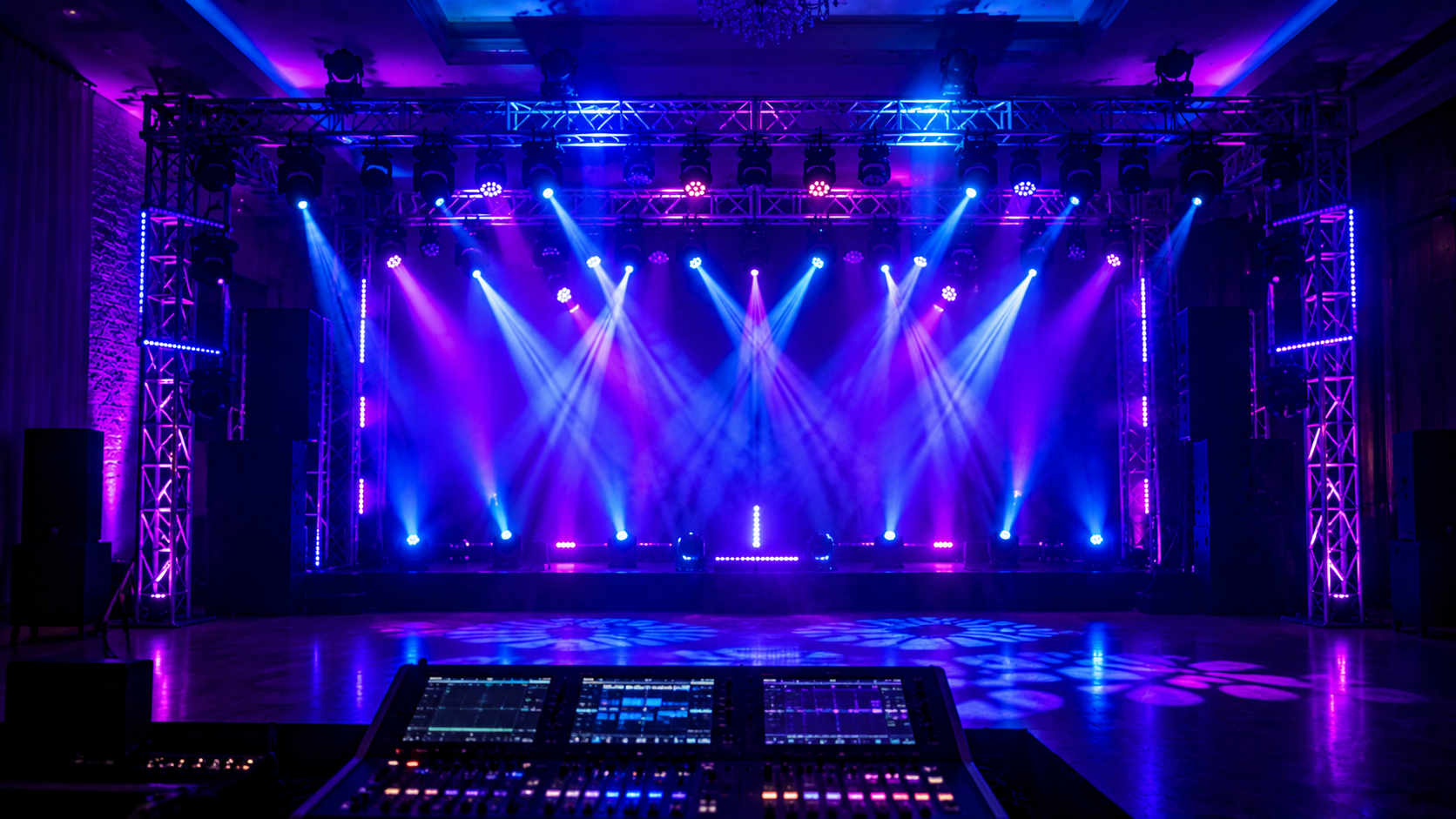 Escenario profesional con múltiples luces controladas por DMX